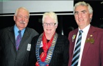 Past District Governor Don Stephens (right) and outgoing Mudgee Rotary president Des Dowdy induct incoming Mudgee Rotary president Jan O’Brien
