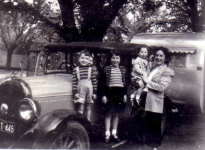 Ian Morgan with sisters and mum, 1927 Chevrolet Tourer and van, 1950