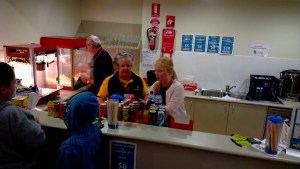Sally Colley and rotary exchange student Pernille Christiansen served customers while Bob Colley in the background was busy making popcorn