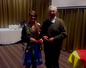 Rotarian, Peter Windeyer presented a gift to Lauren Flack